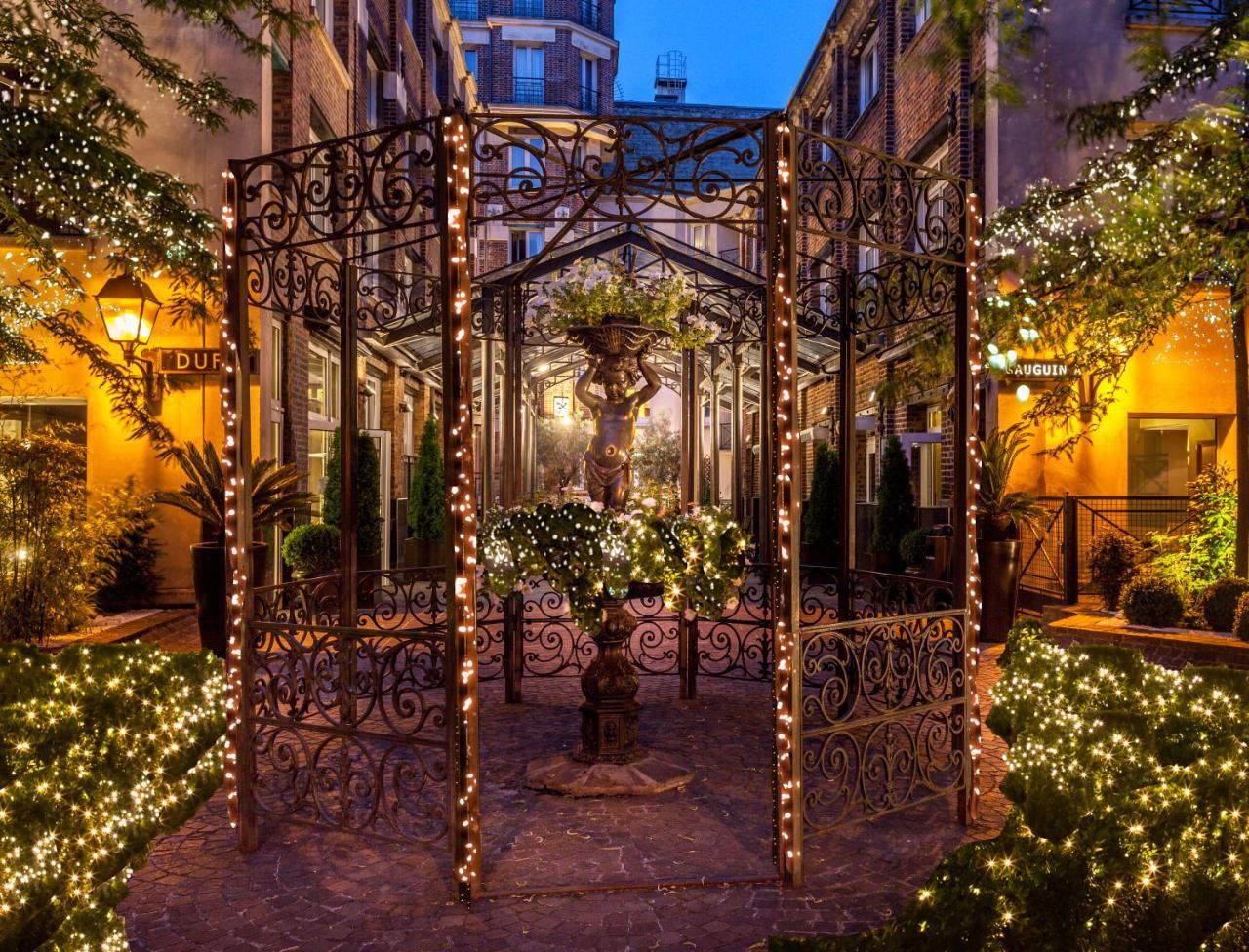 Les Jardins Du Marais Hotel Paris Exterior foto